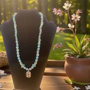 Turquoise colored Tibetan Beaded Necklace with Dragon Pendent